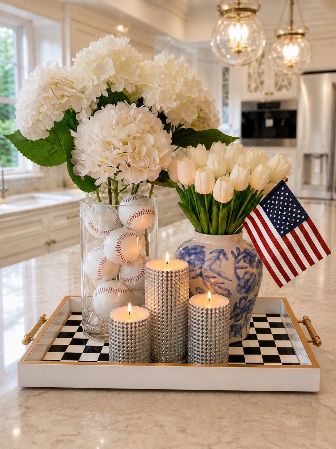 Classic summer glam with a patriotic twist 🇺🇸✨ Mixing blue & white florals, baseball accents, sparkling candles and the cutest black + white check tray for a centerpiece that feels equal parts elegant and fun! Perfect for Memorial Day, the 4th of July, summer entertaining or baseball season decor. ⚾️🤍

#LTKstyletip

#LTKSeasonal #LTKHome