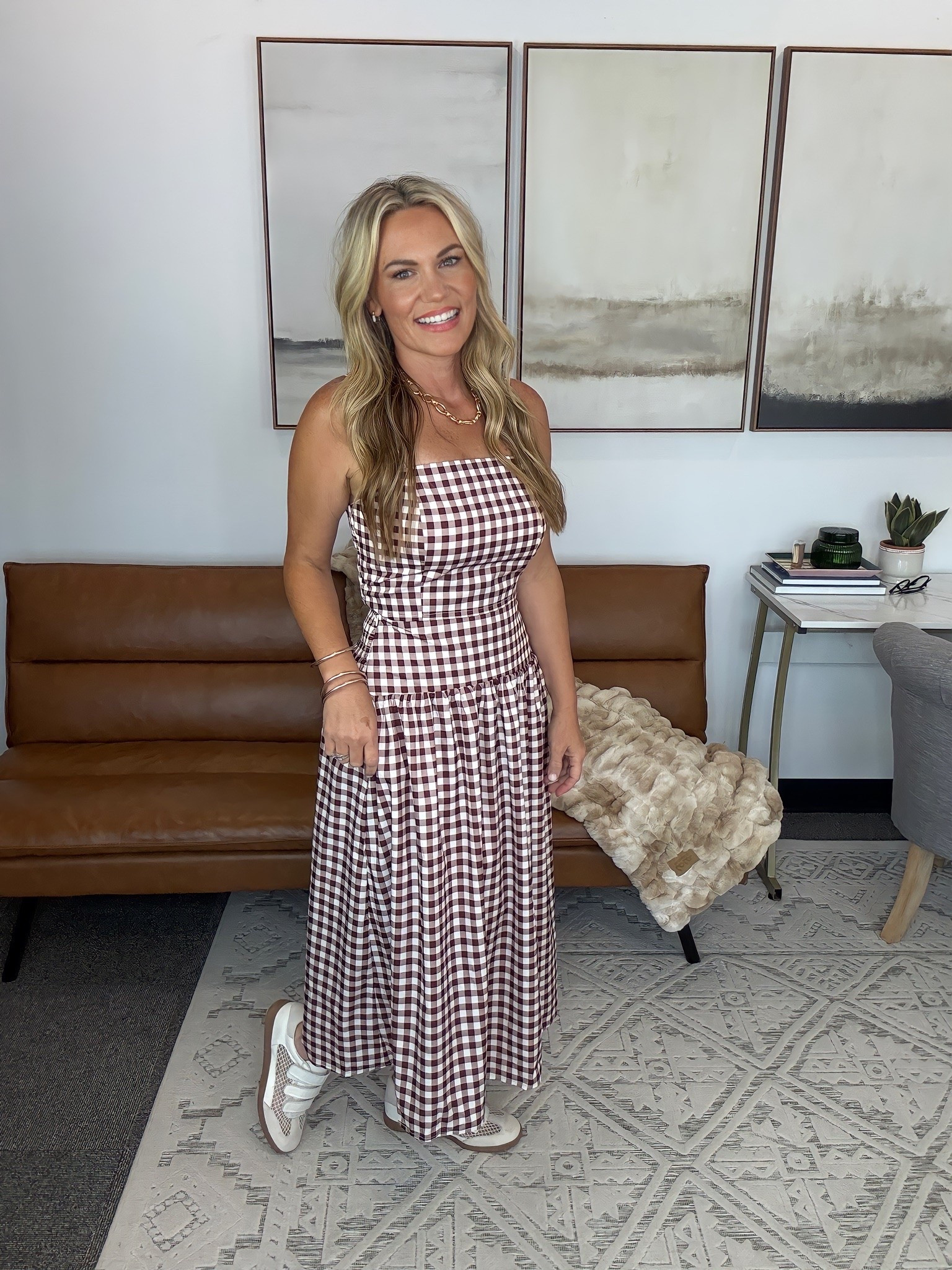 This is the kind of set I’d wear on a busy Saturday when I want to be comfortable but still feel pulled together. The top sits close through the bodice, while the fuller midi skirt gives you room to move, and I love that both pieces can be styled separately when I want more mileage out of them.

Gingham two piece set, matching skirt set, midi skirt outfit, casual weekend style, sneakers outfit, late summer fashion, early fall outfit, versatile matching set, everyday style, AudrieDollins

#LTKootd #LTKSeasonal #LTKOver40