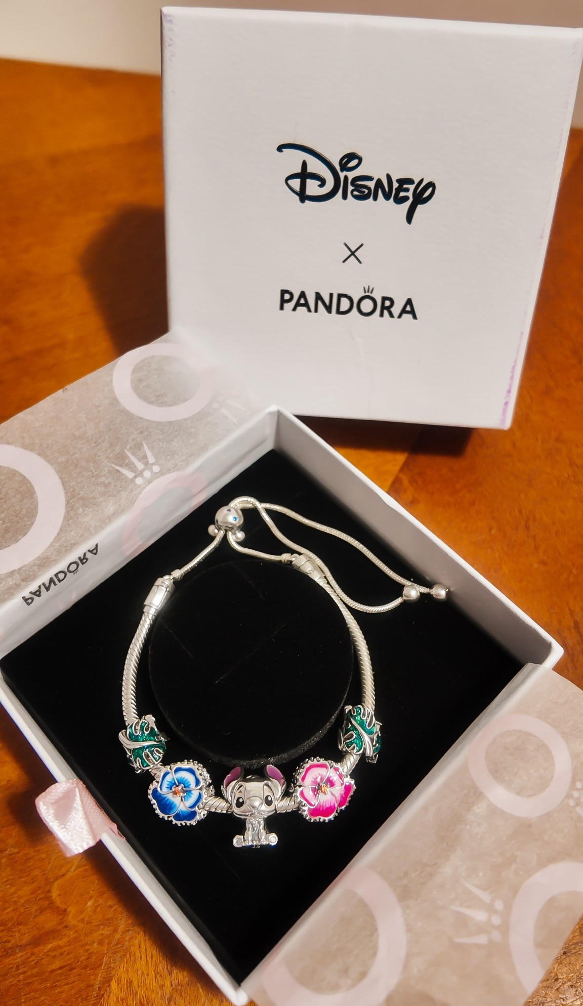 This Pandora charm bracelet is one of my favorite souvenirs from our trip to Aulani!

I was able to build this bracelet right at the Hale Manu Boutique. The beautiful Hawaiian flowers and plants all over Aulani’s resort grounds inspired me to choose a few of Pandora’s floral charms to accent the center piece of my bracelet; a Pandora Disney Sitch charm! Everything I chose at Aulani is available either on the Disney Store site or in Pandora’s site! I’ll link everything so you can add onto your own bracelet (or build your own!)! 

#Aulanisouvenirs #Disneypandora #pandoradisney #pandorajewelry #pandoracharms #disney #aulani #disneychristmas  

#LTKHoliday #LTKSaleAlert #LTKGiftGuide