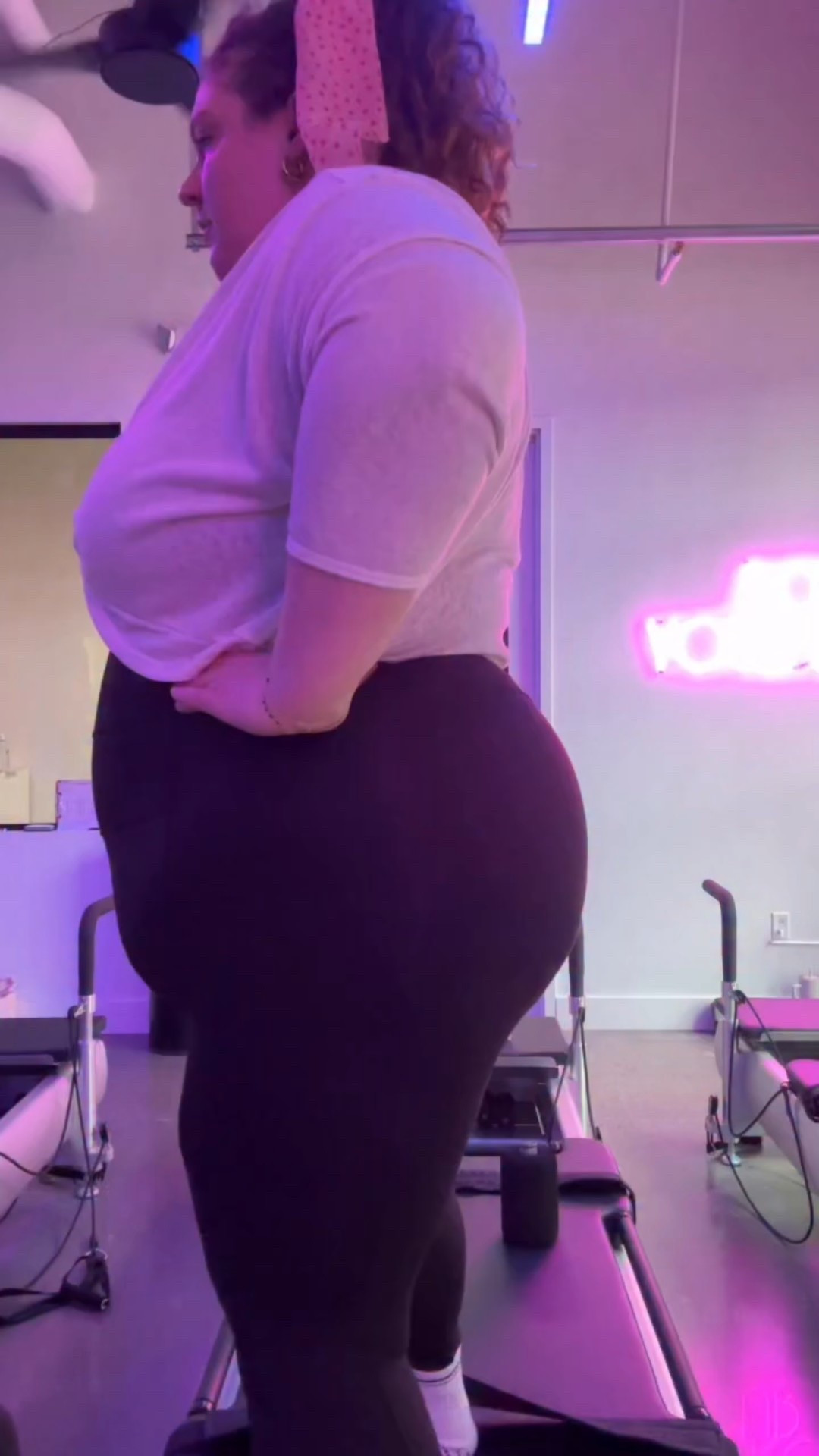 What @bodyrokstudio is like as a plus size girlie 💪 while I don’t clearly look like your average fitness girlie I am quite strong. I’ve been doing Pilates since 2023 and am working on my Pilates instructor certification. I’m really comfortable in my practice and am trying to branch out out and try different styles of Pilates / lagree and find exercises that work my cardiovascular system a little harder. I rarely run out of breath, break a sweat, or increase my heart rate in traditional Pilates which I’ve loved but now that I’m getting strong I want my VO2 max to increase a bit too! @bodyroknashville is more of a challenging workout for me since it’s faster paced and more cardio focused! It’s more of a blend of fitness styles and it’s done on a megaformer which I have surprisingly liked. It feels sturdier and is more wide than a traditional reformer and feels more secure. Generally I’m terrified to hop onto a reformer but I easily pop up onto the megaformer because it doesn’t creak like a wooden reformer does. Okay enough nerding out on technical specs (this was for my other Pilatesheads lol) -> what does this mean for plus size girlies? I recommend getting comfortable with some level of cardio fitness and/or Pilates or lagree before going to bodyrok. Could you do this with zero exercise knowledge? Obviously it’s a guided class. I think the biggest thing is bigger bodies need more springs when doing certain exercises. Unless you know this you will struggle on planks, pikes, standing moves, and bridging. I’m 3x the weight of a normal student and usually need 3x the springs to do the moves. Even regular Pilates teachers don’t adjust this unless I tell them I need more support. So, just be aware you need more springs on some of the moves in any type of reformer class! This has been an awesome addition to my current rotation and I can’t wait to increase my cardio tolerance! 

🔗 If you comment KIMMY I’ll send you a link to my workout gear! 🔗

#plussizepilates #bodyrok