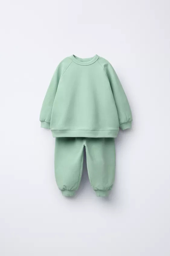 Two-piece matching set. Crew neck sweatshirt. Long sleeves. Rib trim. Back snap button closure. ... | Zara US