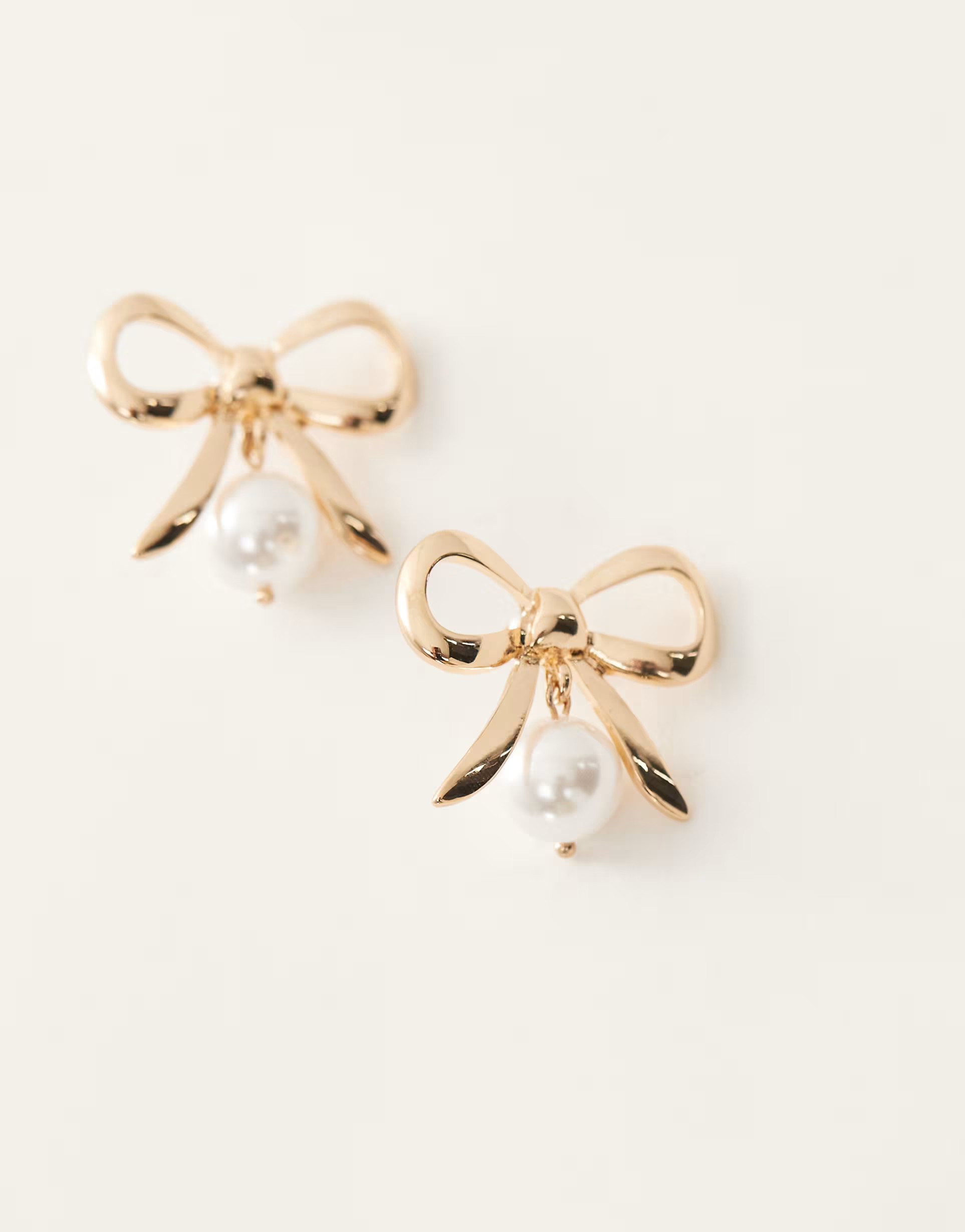 Reclaimed Vintage bow earrings with pearls in gold | ASOS (Global)
