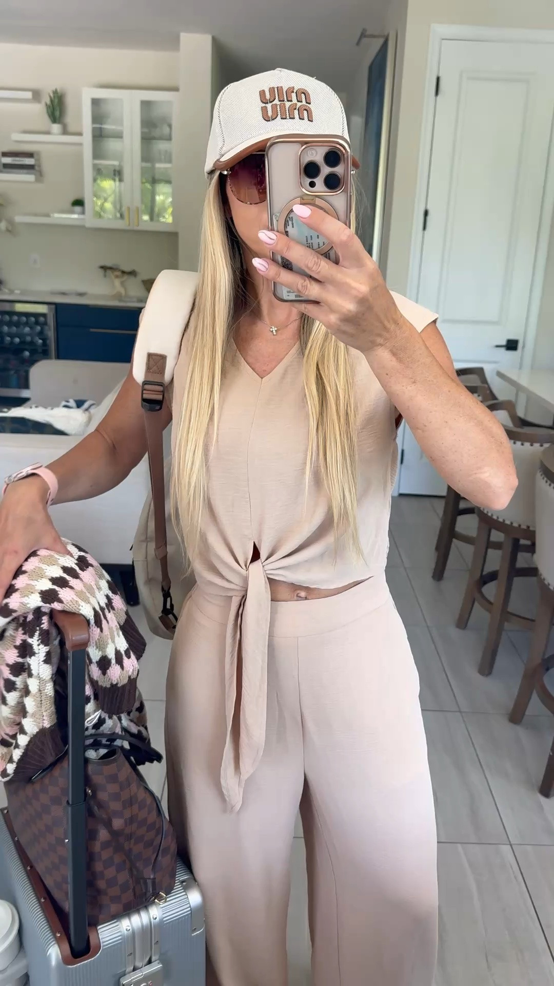 From airport to lunch without changing 🤍 This neutral set is exactly why I love easy travel outfits. Lightweight, Comfortable for sitting on a plane, light enough for warm weather once I land, and polished enough to start the day right away.

airport to lunch outfit, beige airport outfit, travel outfit ideas, comfortable matching set, destination ready outfit, warm weather travel outfit, airplane clothes women, city browsing outfit, effortless travel style, lounge set outfit

#LTKActive #LTKU #LTKTravel