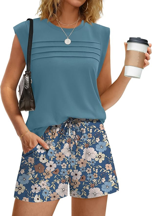 This set is giving effortless summer vibes. 🌸💙
The floral shorts are the star of the show, and paired with the soft blue top, it's the kind of outfit that looks put together without trying too hard. Perfect for brunch, vacation days, or running around town in comfort.
#SummerStyle #FashionFinds #CasualChic #VacationStyle #StyleInspiration 

 