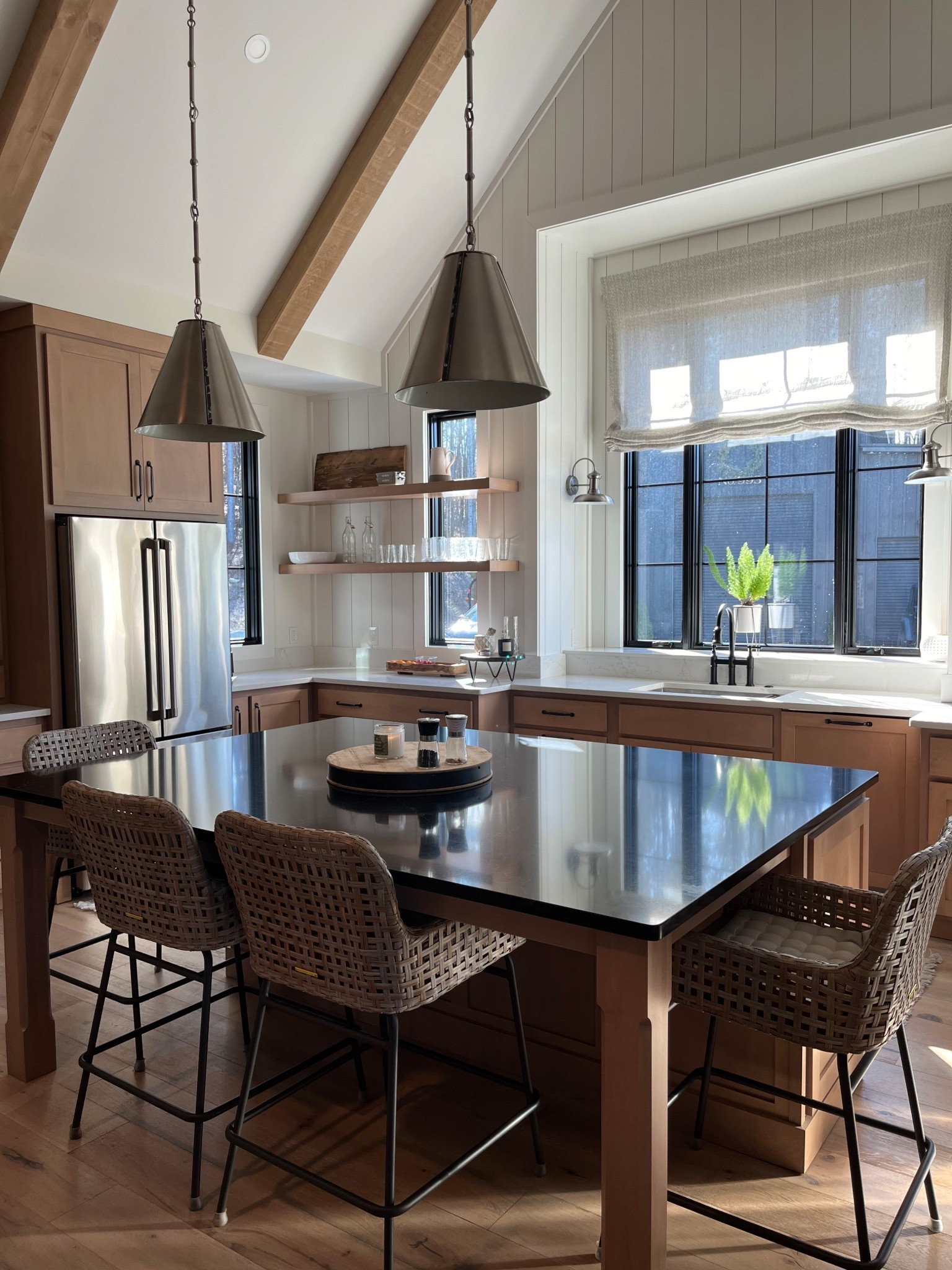 We are huge fans of the casual dining that happens around the kitchen island. This kitchen was part of our take on a modern farmhouse. #ModernFarmhouse

#LTKHome