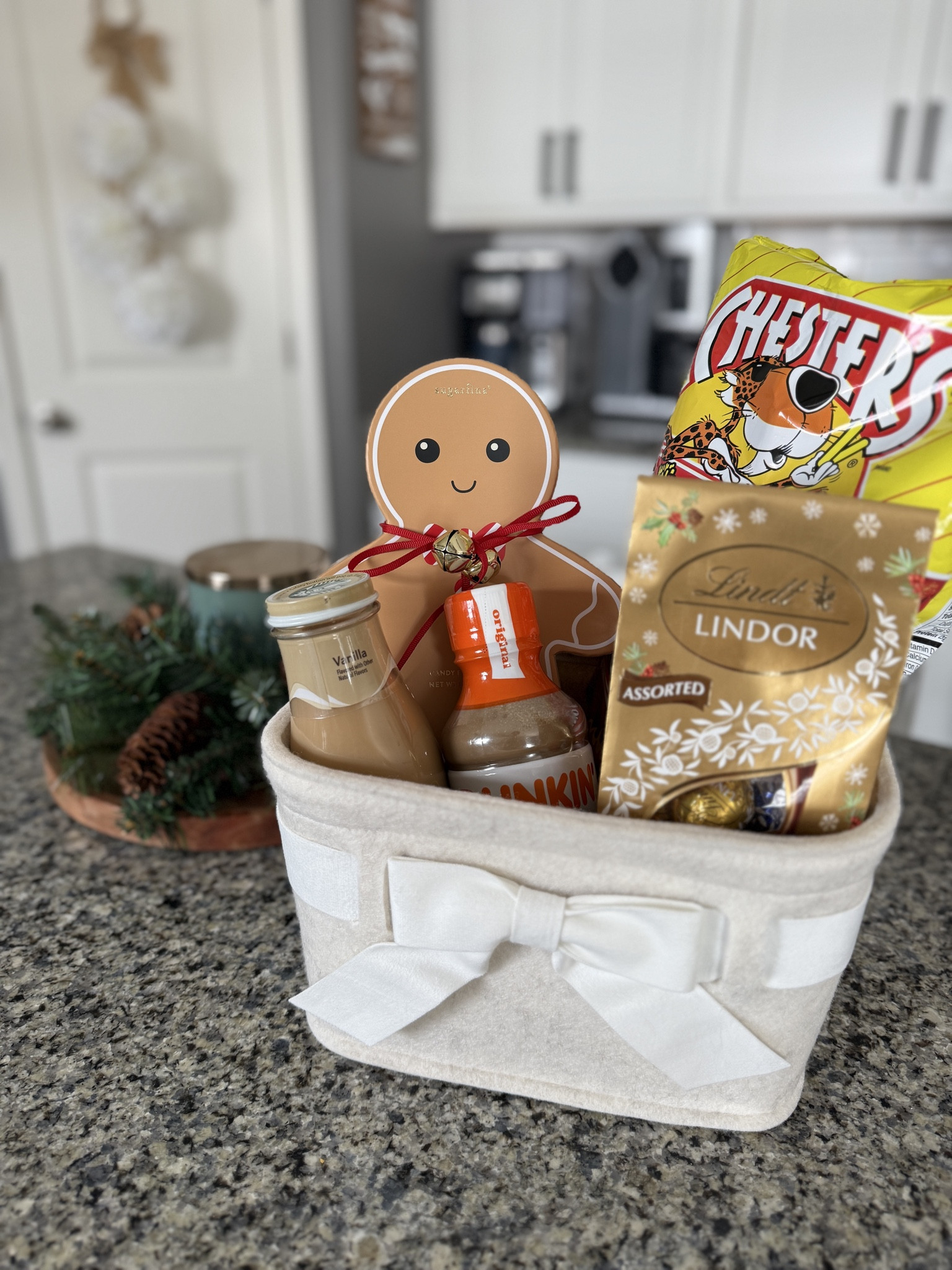 100% Target based teacher gift basket idea. A neutral bow basket, gingerbread gift box with candy in it, some crinkle paper to add height and decoration, and don’t forget to add some of their favorite snacks! Great, easy teacher gift idea!

#LTKFindsUnder50 #LTKHoliday #LTKGiftGuide
