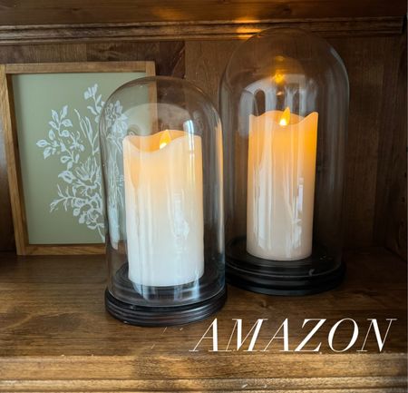 These flameless candles are amazing! They have a daily setting so that they will turn on the same time each morning! The candle covers are not linkable, but a similar option is below!