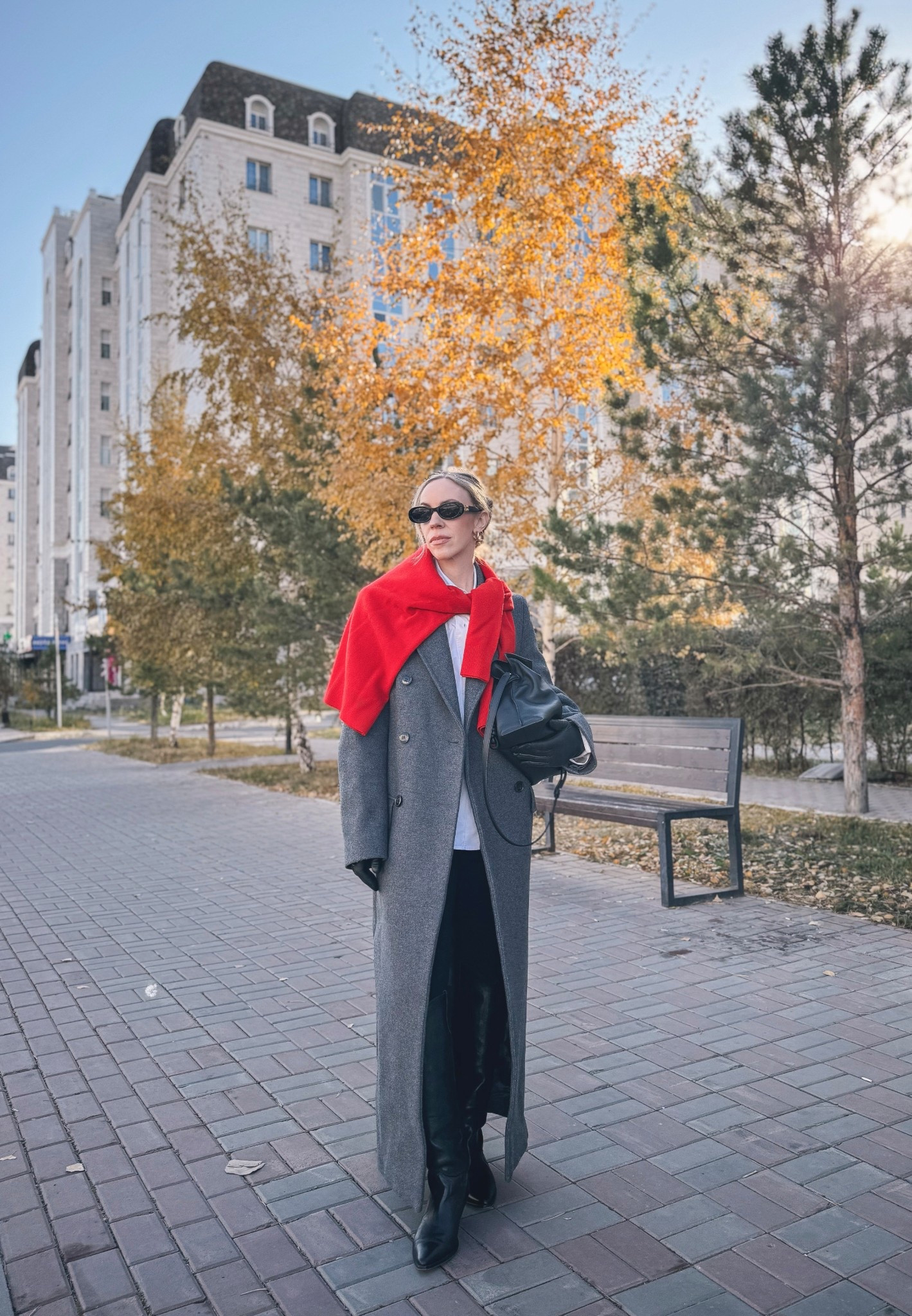 Oversized gray wool coat with bright red sweater, Spanx stirrup leggings, black western boots, black leather gloves, Loewe Flamenco clutch 

#LTKItBag #LTKFindsUnder100 #LTKSeasonal