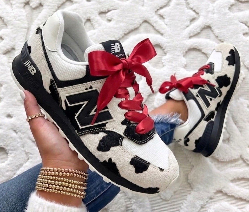 New balance cow print sneakers runs true to size. Changed the laces for $10