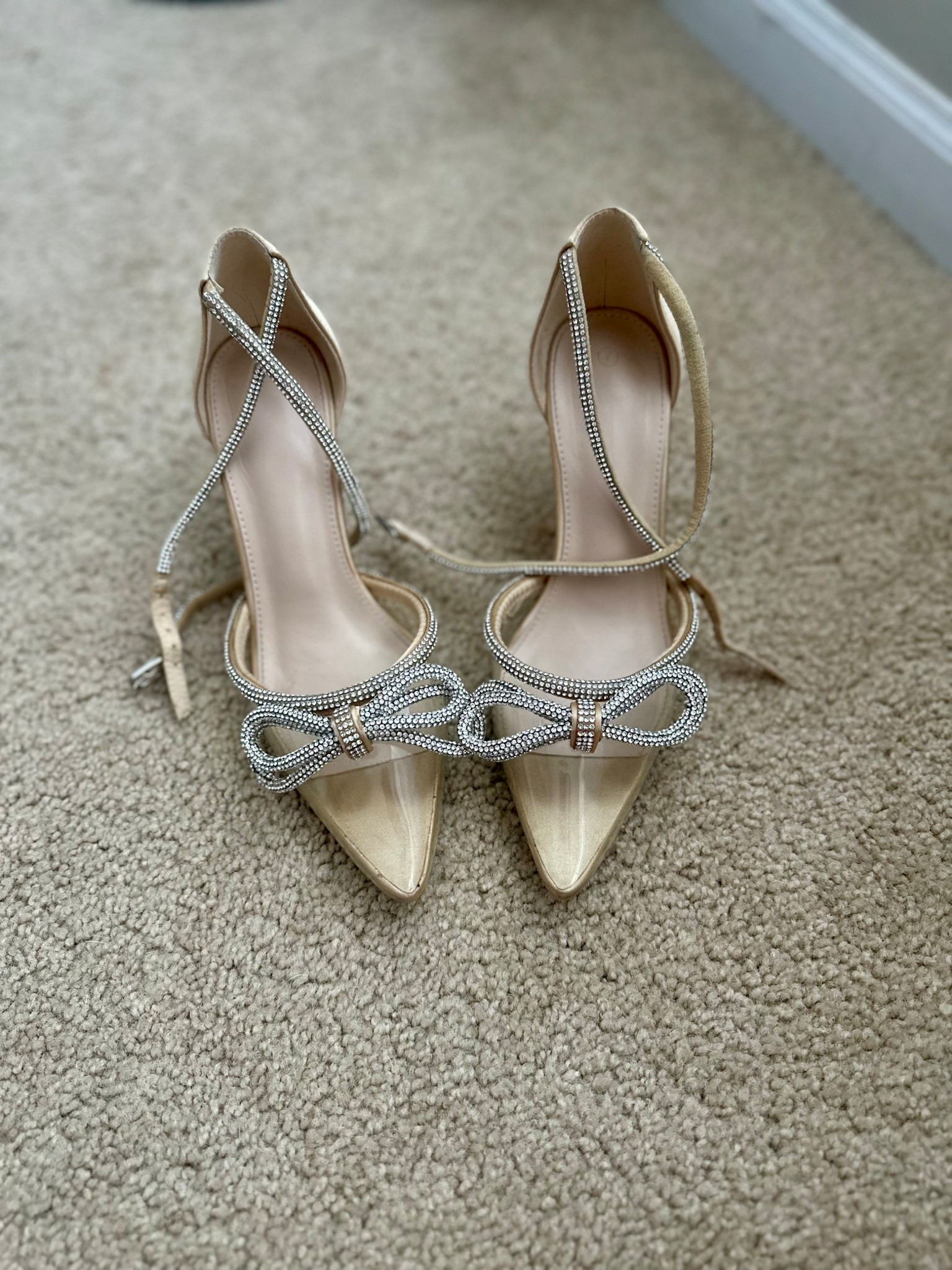 These crystal bow heels are such a pretty option for holiday parties, weddings, or date nights. The rhinestone straps and pointed toe make them look designer but still budget-friendly.



#LTKFindsUnder50 #LTKHoliday #LTKStyleTip