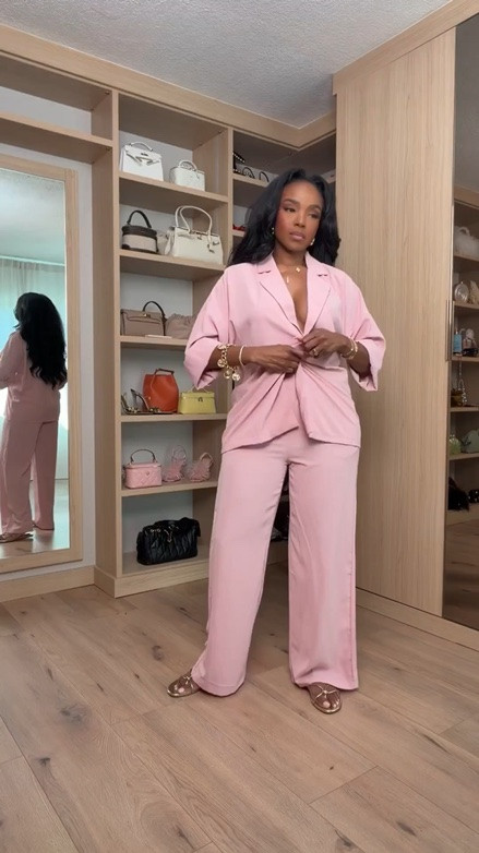 Hi Babes!

Okay this pink set is the definition of pretty and polished. The relaxed blazer-inspired top paired with the flowy wide-leg pants creates such an effortless statement look, and the yellow mini bag adds the perfect unexpected pop of color.

The fit is what makes this set so good. It's tailored enough to look elevated but relaxed enough to feel comfortable all day long. The wide-leg pants create beautiful movement, and the soft pink color is so feminine and chic.

Where to wear this:
• Bridal showers
• Girls' brunch
• Vacation dinners
• Spring and summer events
• Lunch dates

Accessories:
The yellow mini bag steals the show and adds the cutest contrast against the pink. Finish the look with gold jewelry and neutral sandals for an effortlessly luxe vibe.

Everything is linked below

xx Kira | IG: KirasFashionFinds

34D - 27 - 40 • Size Small or 4