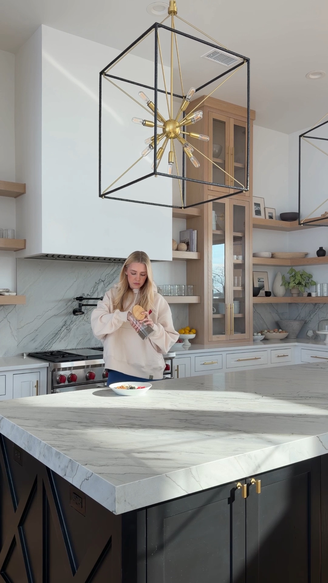 Real life over here. Throwing something together at the island while trying to get ahead of a busy week.

kitchen island, modern kitchen, everyday kitchen, neutral home, marble countertops, warm wood cabinets, busy weekend prep, lived in home, LTK home finds
