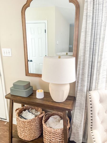 Neutral entryway decor with small space console table, ceramic lamp, faux leather boxes, woven baskets and wall mirror 

#LTKSeasonal #LTKFind #LTKhome
