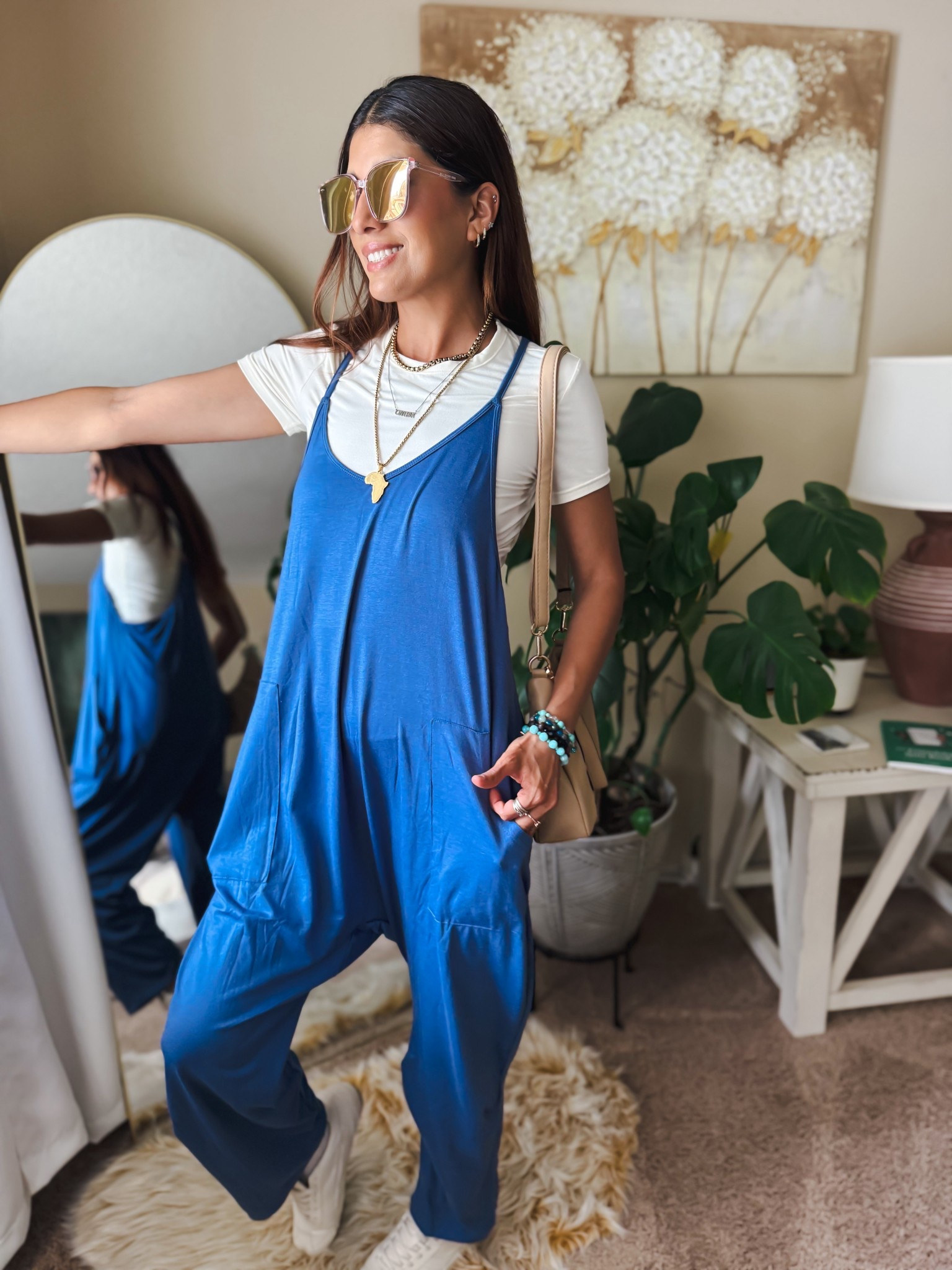 Easy, comfy, and cute 🤍 This Amazon loose jumpsuit is one of my latest finds and I’m obsessed! The relaxed fit, soft lightweight fabric, and pockets make it perfect for everyday wear. I layered it over a basic tee with sneakers for an effortless casual look you can wear running errands, coffee runs, or weekend outings. Such a versatile piece you can style all year long!

Amazon fashion finds never disappoint.
Size XS

amazon jumpsuit, amazon loose jumpsuit, casual jumpsuit women, relaxed fit jumpsuit, baggy jumpsuit outfit, amazon fashion find, casual everyday outfit, comfy travel outfit women, sleeveless jumpsuit outfit, loose overalls women, amazon spring outfit, casual chic jumpsuit, pocket jumpsuit women, everyday amazon fashion

#amazonfashion #amazonfinds #amazonstyle #ltkstyle #ltkfashion #casualstyle #everydayoutfit #comfyfashion #jumpsuitstyle #effortlessstyle #amazonoutfits

#LTKSpringSale #LTKOver40 #LTKootd