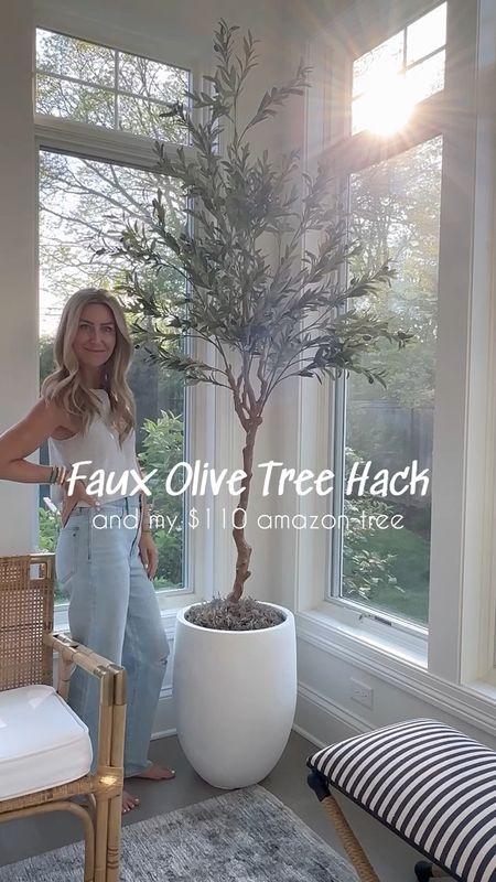 Fave Amazon faux olive tree hack! Snagged the 7 foot tree and made it almost 9 feet tall using this planter, foam bricks and layered it with some moss!

(6/2)

#LTKVideo #LTKStyleTip #LTKHome