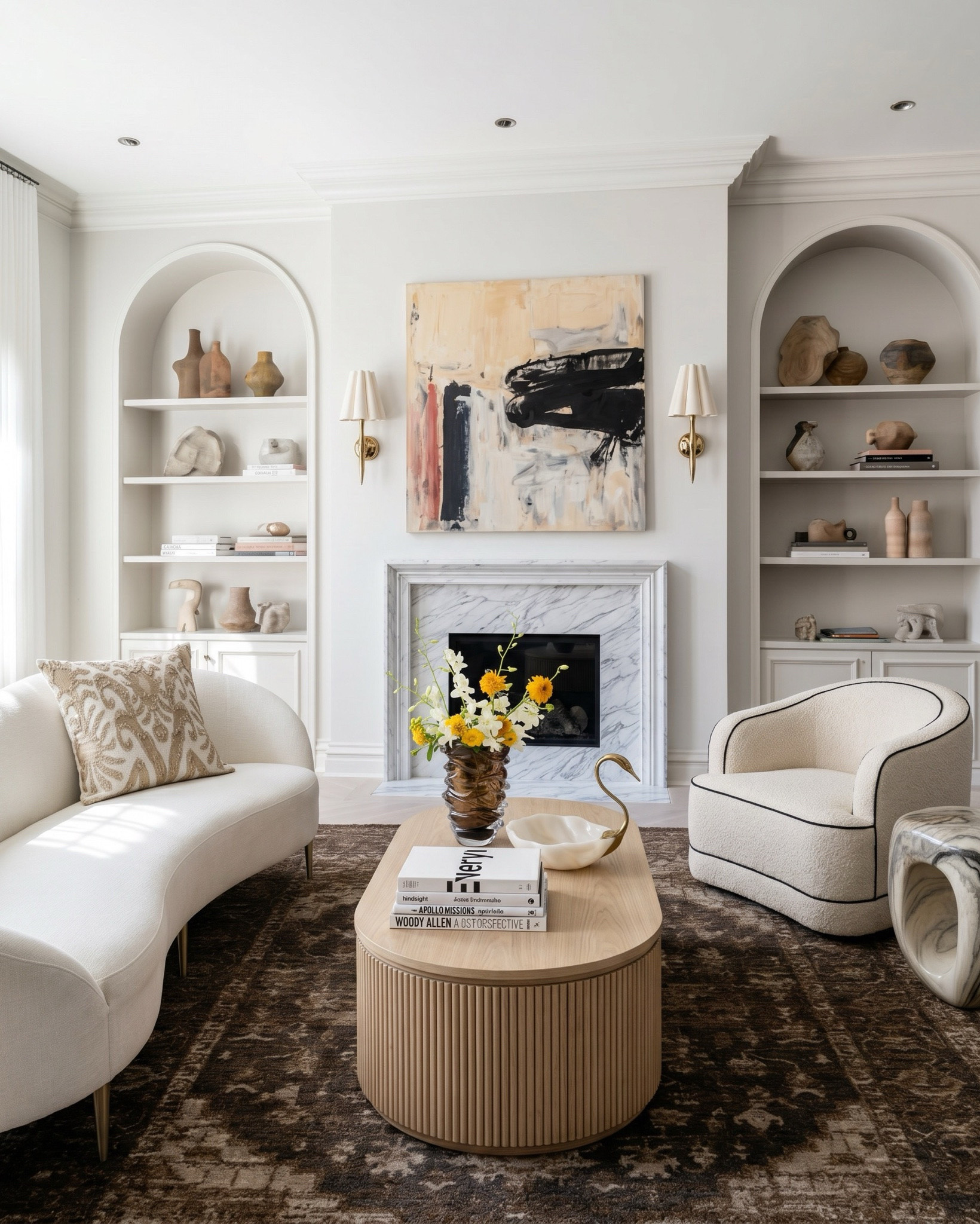 From a dramatic black and white checkered marble entryway to a warm dark wood kitchen, every detail in this home blends classic architecture with modern organic design.
Shop the look featuring:
• Checkered marble floor tile • Natural stone wall cladding • Rustic wood console table • Woven cube ottomans • Large abstract neutral wall art • Black chandelier with linen shades • Brass wall sconces • Oversized ceramic vase • Marble table lamps • White orchid arrangement
Living Room: • Curved ivory sofa • Bouclé accent chair • Fluted wood coffee table • Marble fireplace surround • Arched built-in bookshelves • Brass wall sconces • Neutral abstract artwork • Vintage-inspired brown area rug • Decorative ceramic vases • Coffee table books
Bedroom: • Scenic toile wallpaper mural • Dark wood upholstered bed • Linen bedding set • Velvet accent pillow • Fluted nightstand • Marble table lamp • Textured ceramic vase • Decorative wall mirror
Kitchen: • Marble waterfall island • Marble backsplash • White upholstered counter stools • Marble pendant lights
• Skirted ottomans 
• Scalloped mirrors • Ceramic flower vase • Marble candle holders

#LTKsale #LTKstyletip #LTKhome