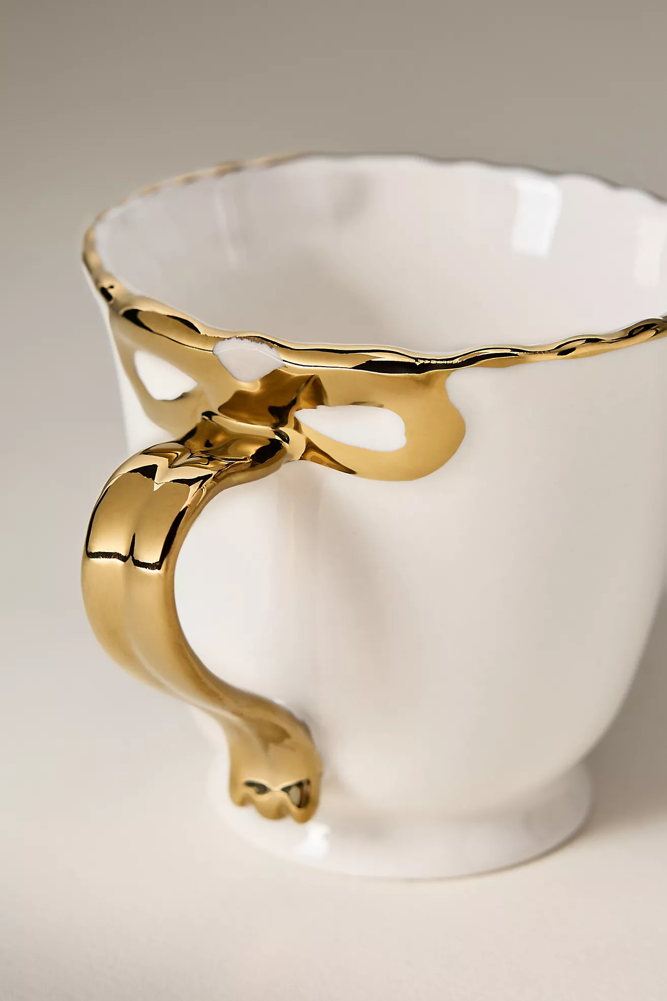 Benedita Bow Stoneware Gold Mug | Anthropologie (US)