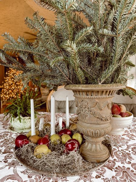 Craft a yuletide masterpiece on your dining table by intertwining vibrant greenery with the allure of fresh pears. Let the crispness of the pears and the verdant charm of the greenery create a symphony of natural beauty, inviting guests into a Christmas celebration that's as visually enchanting as it is delicious.

#LTKSeasonal #LTKHoliday #LTKhome