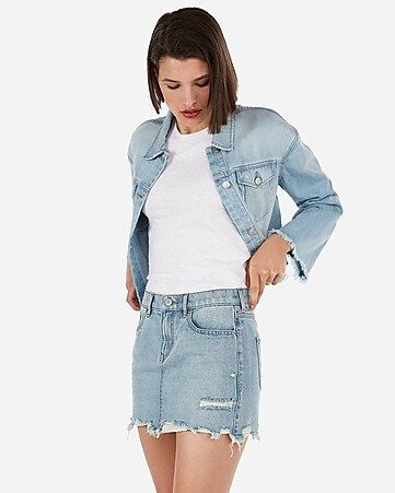 mid rise medium wash distressed mini jean skirt | Express