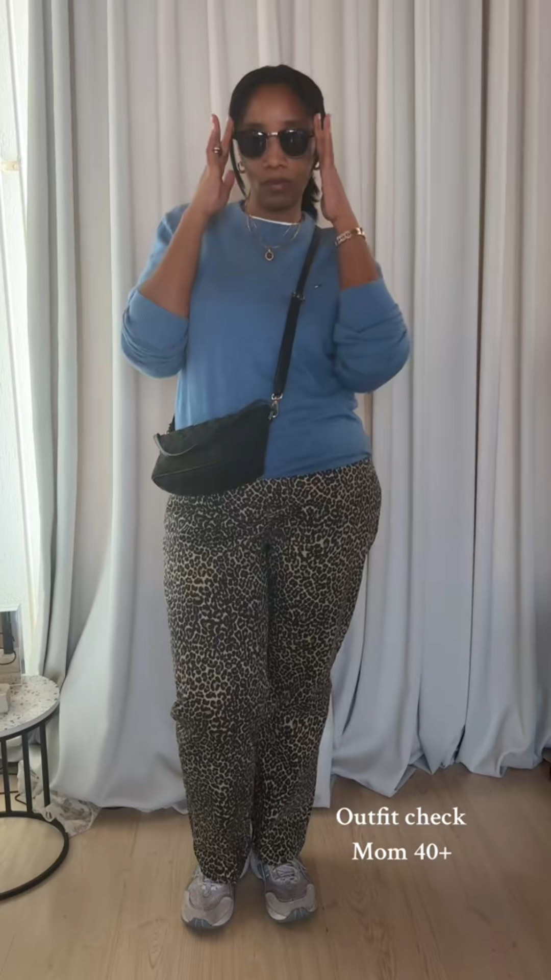 Casual outfit, mom, 40+, animal print, panter print, jeans, sneakers, sweater outfit. 

#LTKFashionMonth #LTKspring #LTKmidsize