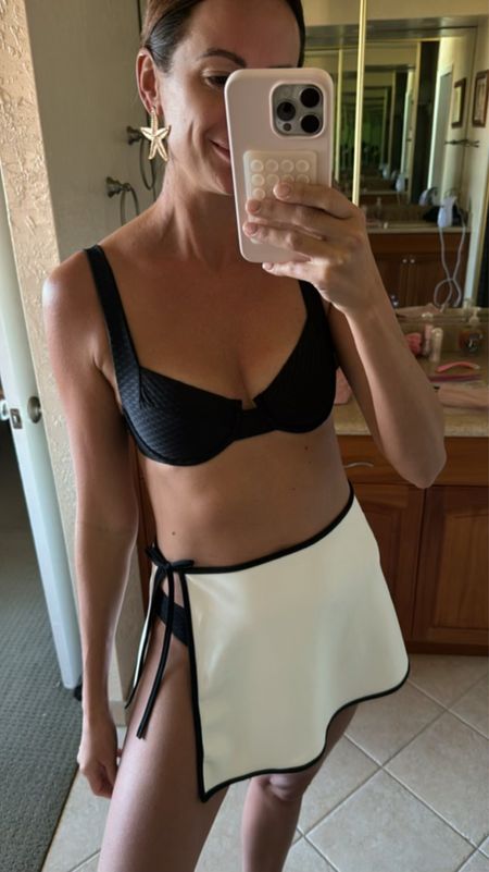 The most chic bikini look I wore in Hawaii! This black bikini and white Saran went so well together! Perfect for your day at the beach, the pool, or around the resort on vacation! 

#LTKfindsunder100 #LTKtravel #LTKswim