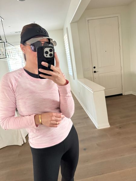 Tennis outfit for a chilly lesson! Love this long sleeved workout top! The perfect layer that’s not too heavy! 

#LTKfindsunder100 #LTKover40 #LTKfitness
