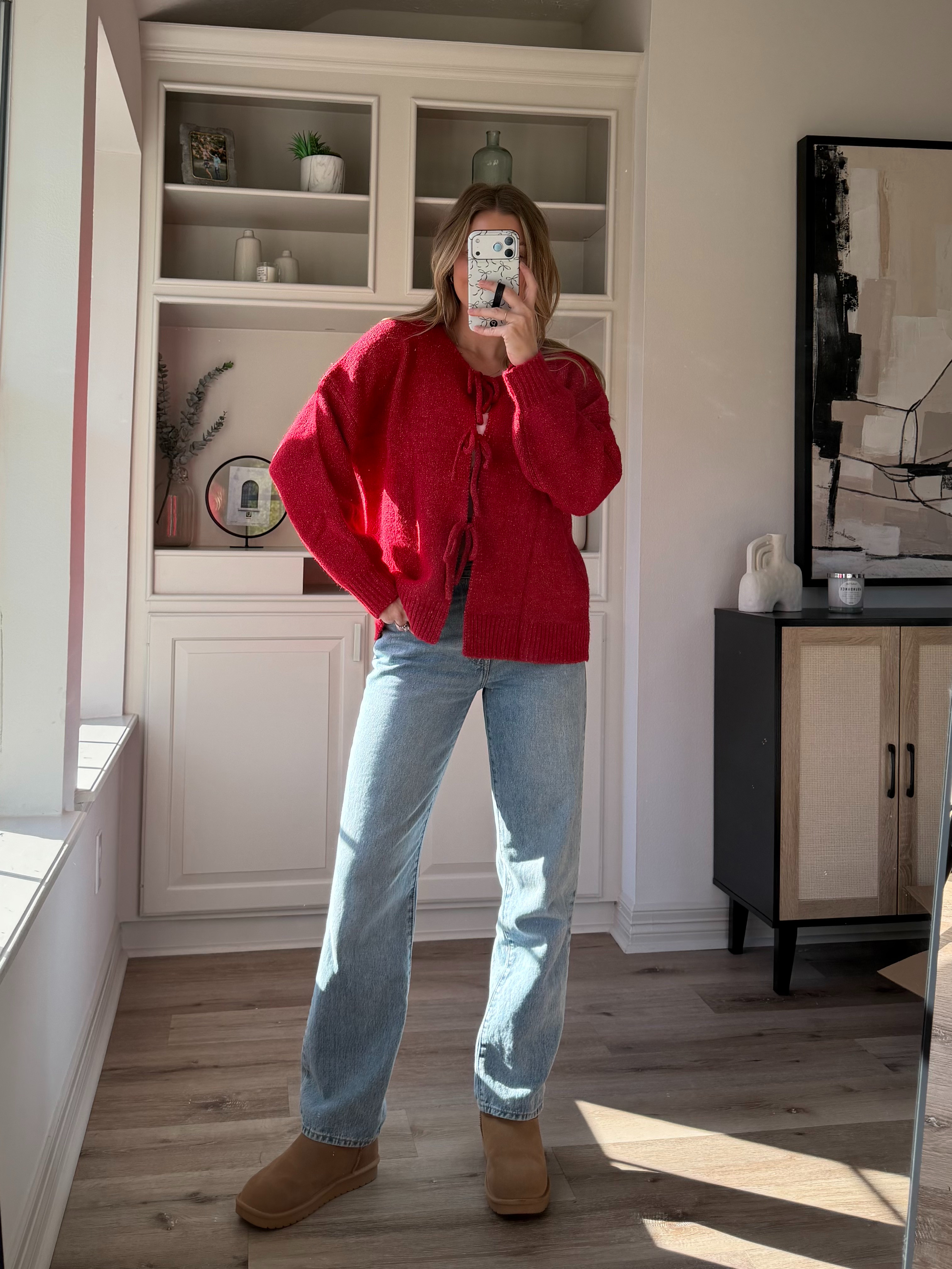 Cutest tie sweater for the holidays! Wearing S.  

 