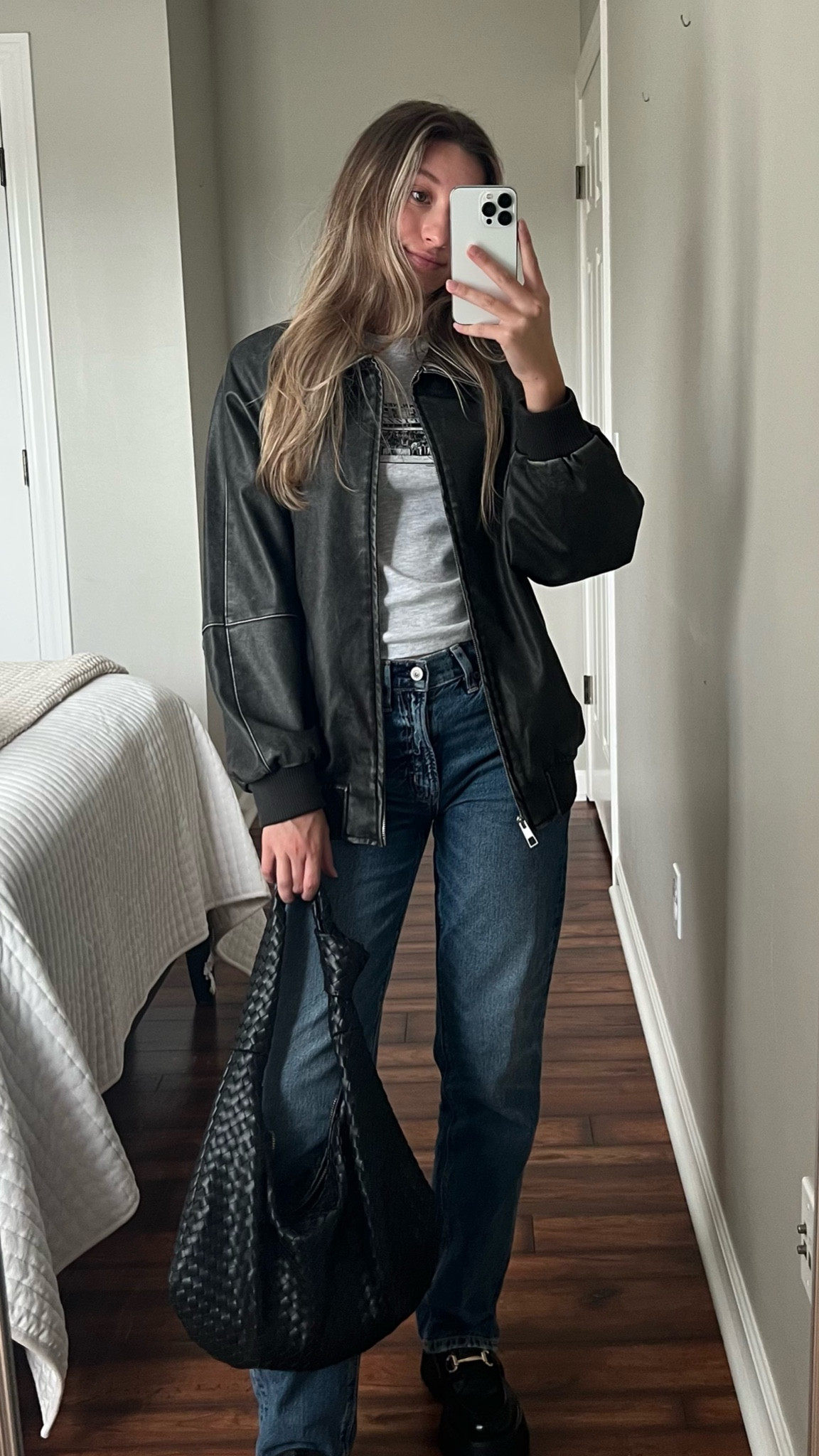 street style, loafers, dark wash jeans, low rise jeans, leather jacket, bottega dupe bag, Melie Bianco Brigitte Large Satchel anthropologie, hailey bieber style

#LTKsalealert #LTKstyletip #LTKSale