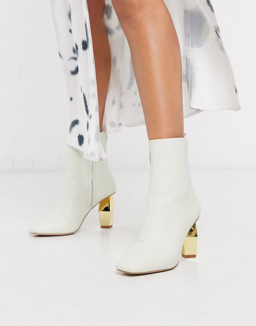 Kurt Geiger Daxon heeled ankle boot with gold heel in white leather | ASOS (Global)