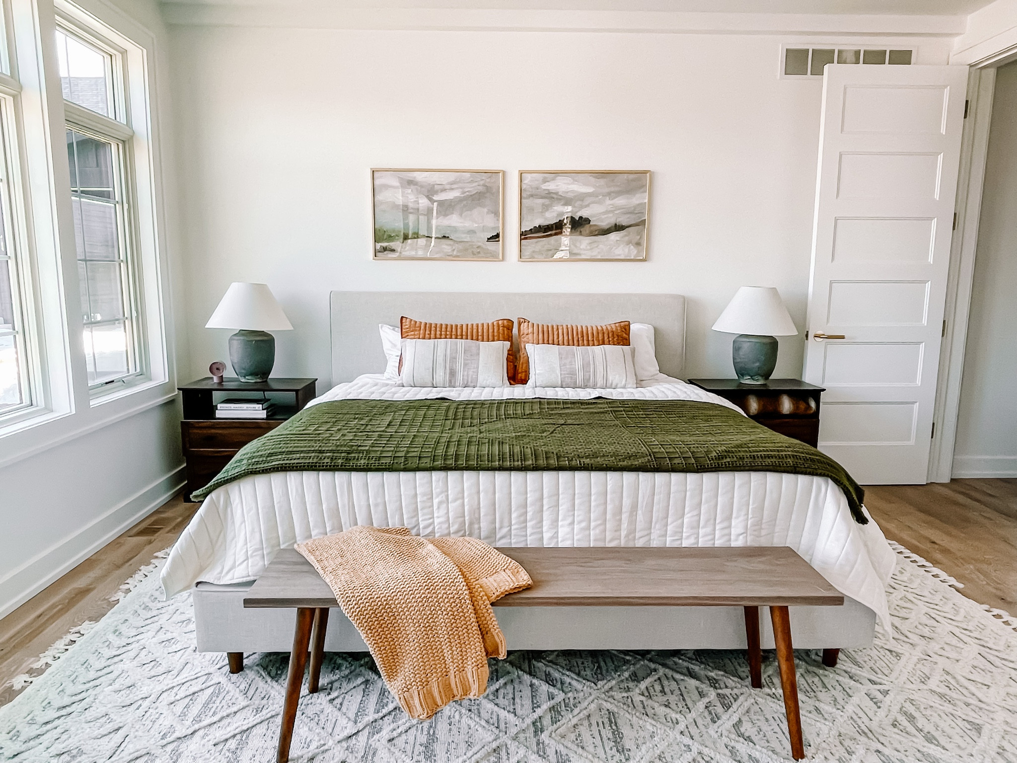 Primary bedroom, king bed, comforter, velvet sham, art prints, lamp, nightstand, throw blanket, area rug 

#LTKhome
