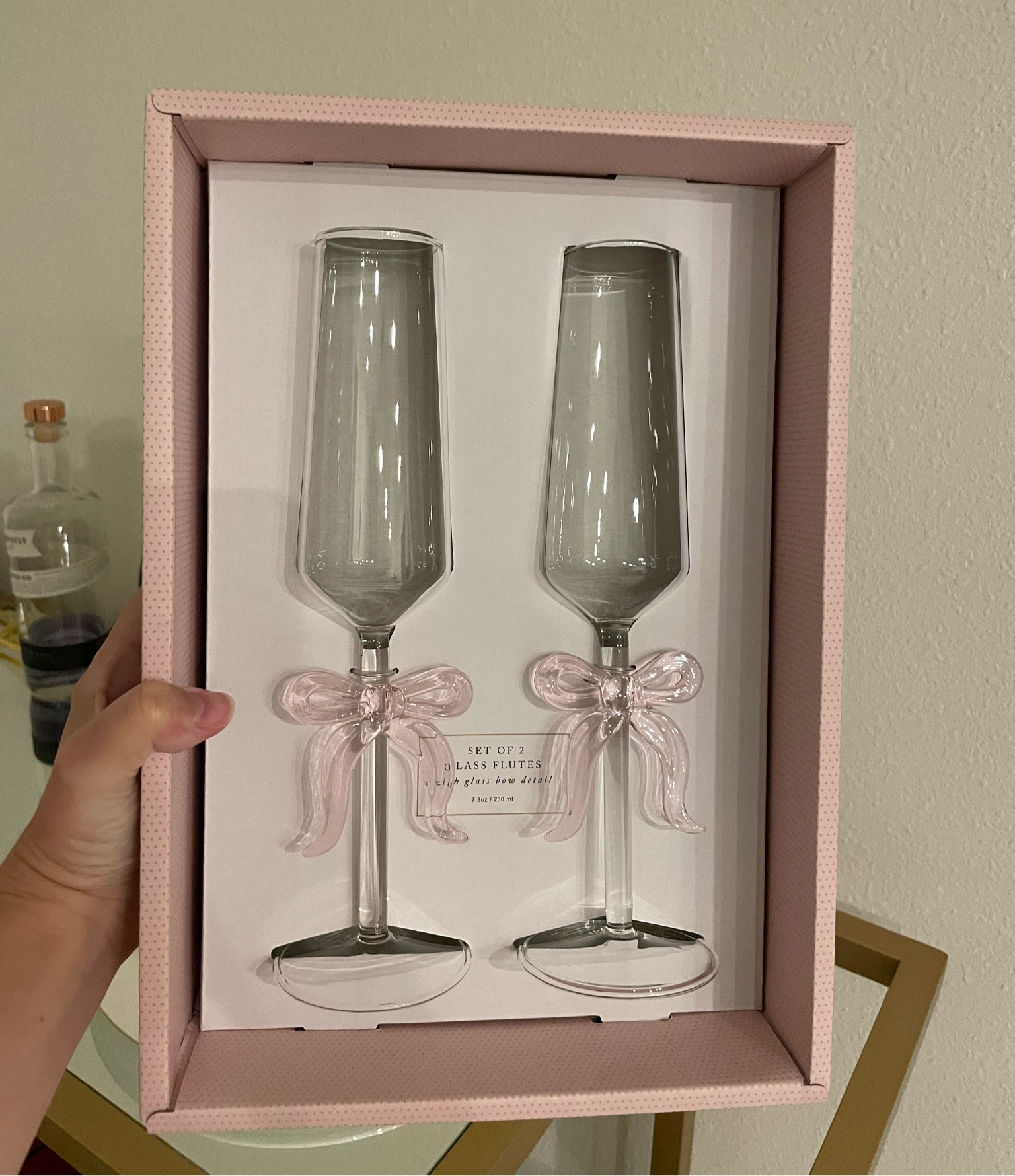 Bow ribbon detail champagne flutes. Trending feminine home decor  