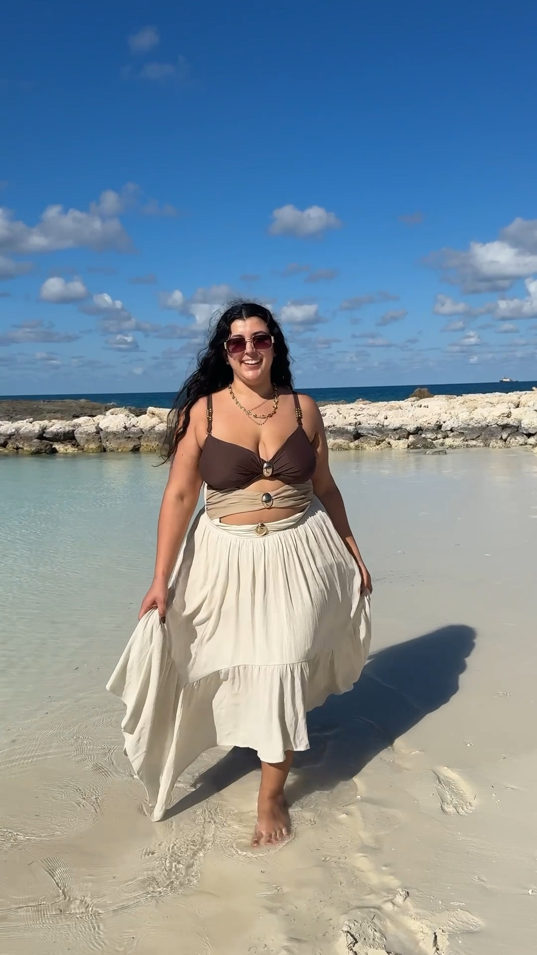 Living my best beach goddess moment 🤎
This plus-size bikini + lightweight skirt combo is my go-to for warm weather trips.
Sunnies, jewelry, and exact pieces all linked!
Plus size swimsuit • beach outfit ideas • curvy vacation looks • travel outfit 

#LTKPlusSize #LTKTravel #LTKMidsize