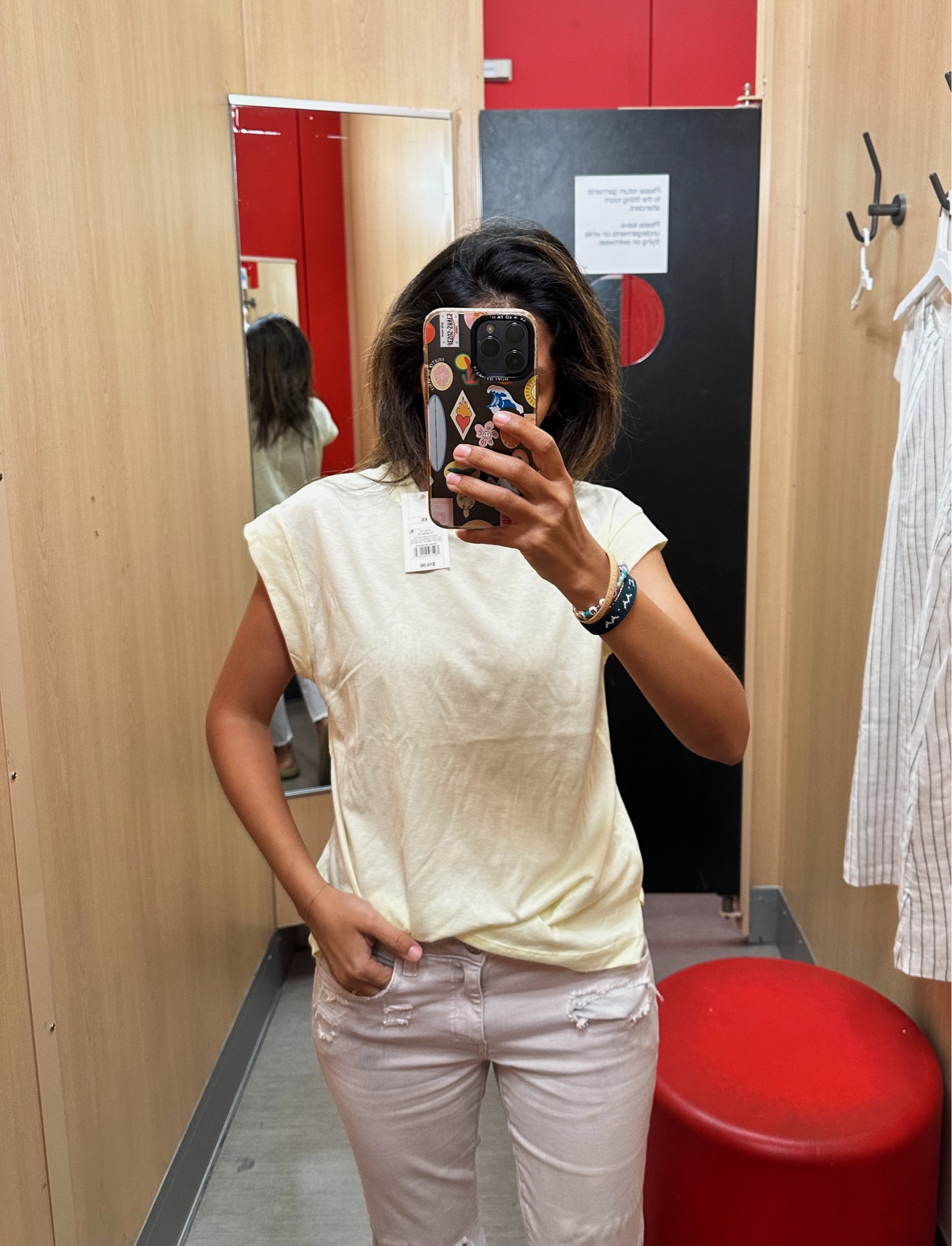 This is a light yellow tank tee. It’s like my favorite white tee from Target. Just another color! Best tee ever!!!!! 

#LTKstyletip #LTKsalealert #LTKSpringSale