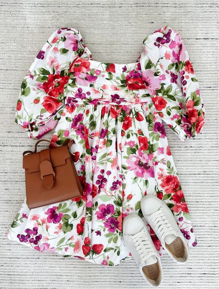 Floral mini dress with puff sleeves, pockets and tiered skirt paired with sneakers for a chic look. I absolutely love this dress for spring and it can be dressed up with sandals or heels! 

#LTKstyletip #LTKSeasonal