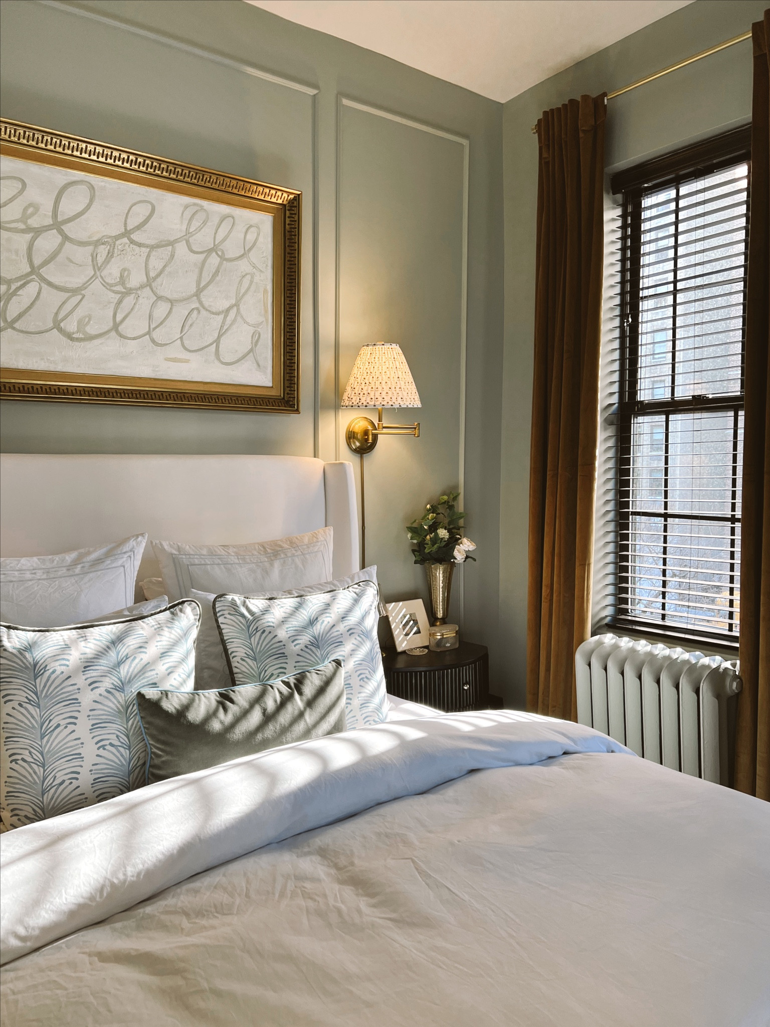 Main bedroom details! The art above our bed was a painting I got from a flea market and re-painted!