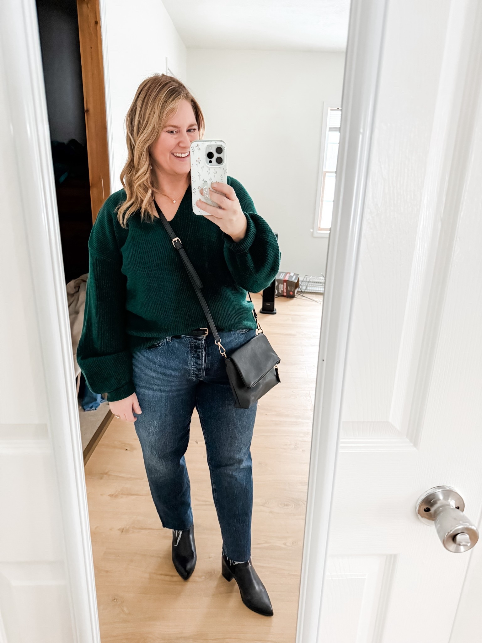 What I wore to go see the Festival of Trees! Wearing an Xl in my Cupshe sweater (has a cute bow in the back!) and a 14 petite in my jeans  

#LTKPetite #LTKHoliday #LTKMidsize