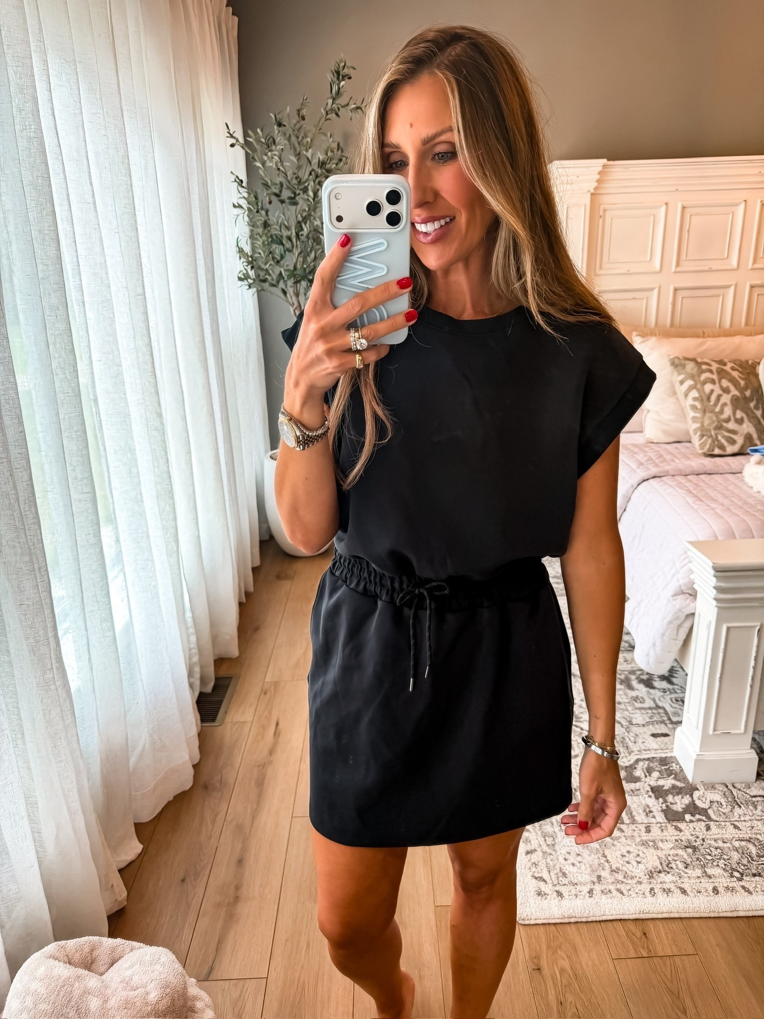 This sporty little black dress has the comfort of activewear but feels much more pulled together than leggings. The drawstring waist gives it shape, and I love the slightly structured sleeves for a little extra coverage.

black dress, athletic dress, casual dress, sporty dress, everyday outfit, comfortable dress, drawstring waist dress, activewear dress, casual style, summer outfit, TheMomInStyle

#LTKootd #LTKActive #LTKSaleAlert