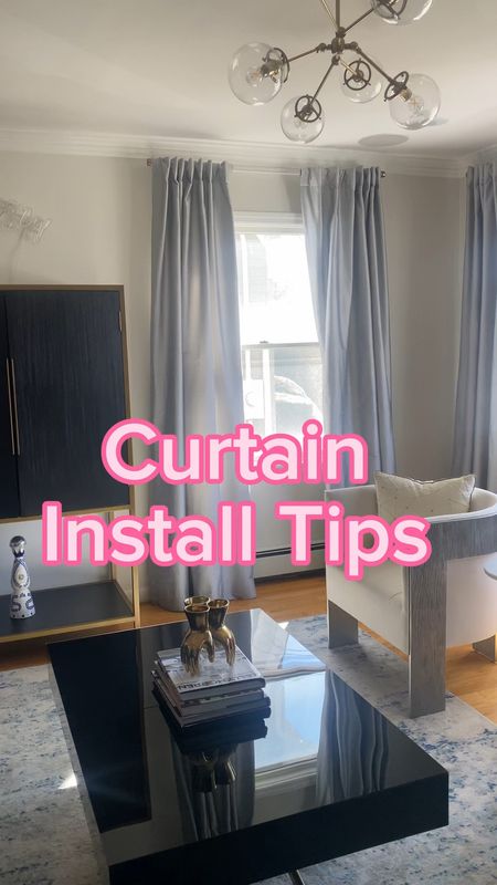 Curtain install tip. Hang yiur drapery rod 3-5” below the ceiling or just under the crown molding to create the illusion of a taller ceiling. #livingroomcurtains #curtaintips

#LTKhome #LTKstyletip #LTKVideo