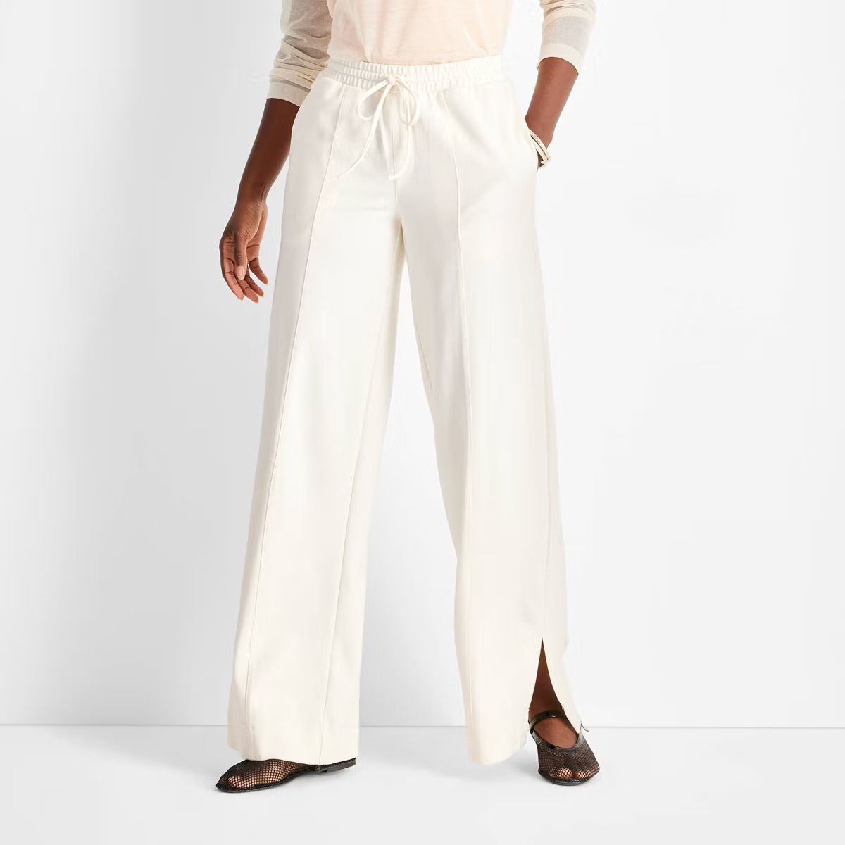 Women's Mid-Rise Knit Track Pants - Future Collective Cream | Target