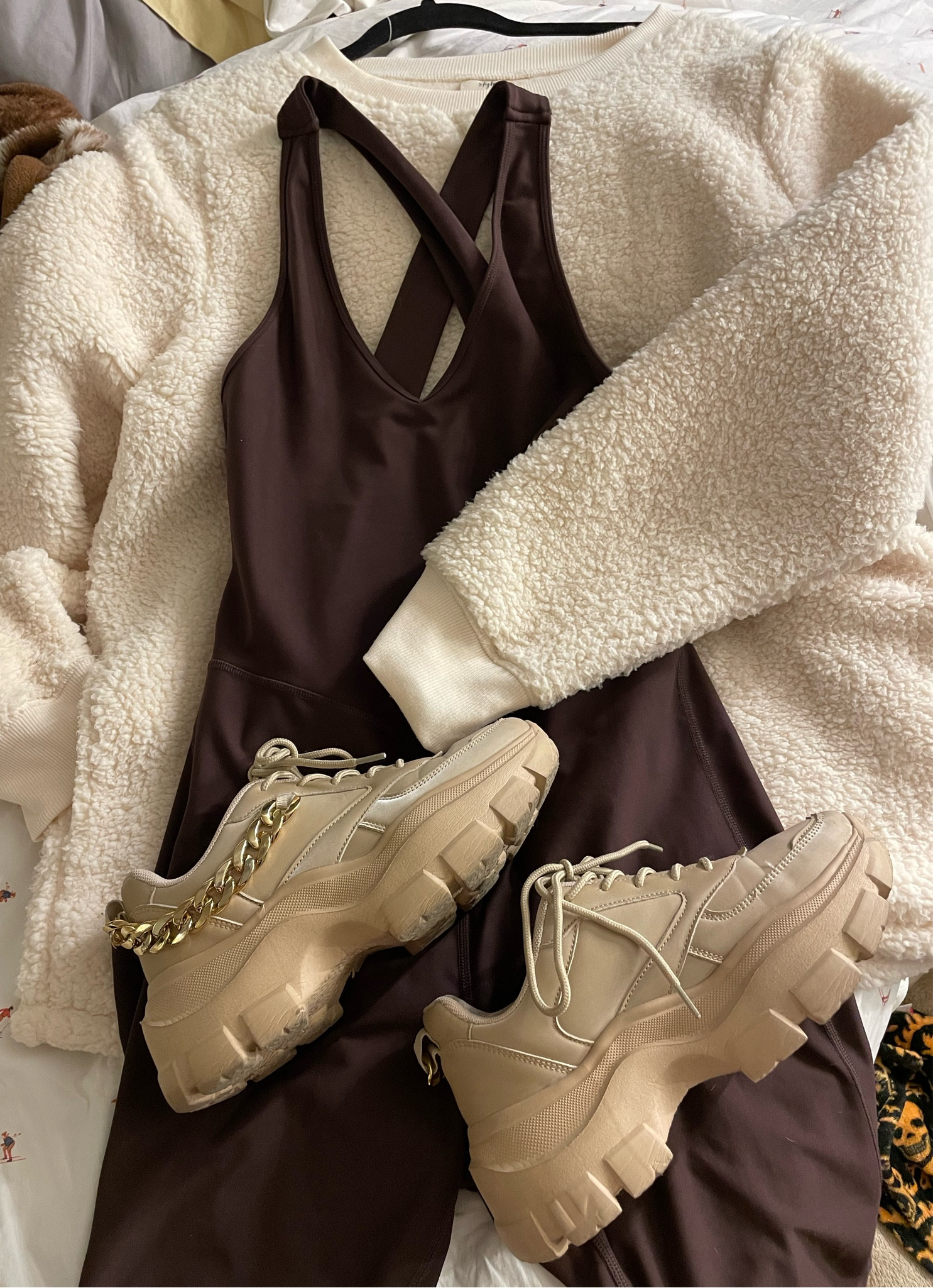 Cozy sherpa sweatshirt with pockets from Macys. Bodysuit from Old Navy perfect for low impact workouts. Neutral sneaker with gold colored chain from Amazon. Perfect pilates fit!

#LTKfit #LTKcurves #LTKSeasonal