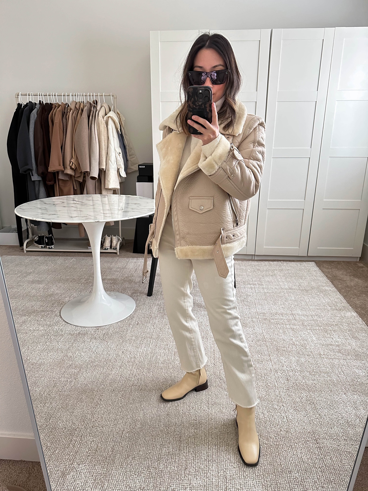 Topshop shearling biker jacket. If you’re in the market for one, this is such a fantastic option! Size up though. On sale!

Jacket - Topshop petite 6
Sweater - Topshop petite xs. Runs oversized. 
Jeans - DL1961 25
Boots - Sam Edelman 5

Neutral winter outfit idea. Shearling biker jacket for petites. Street style. Cream capsule wardrobe. 

#LTKsalealert #LTKunder100 #LTKSeasonal