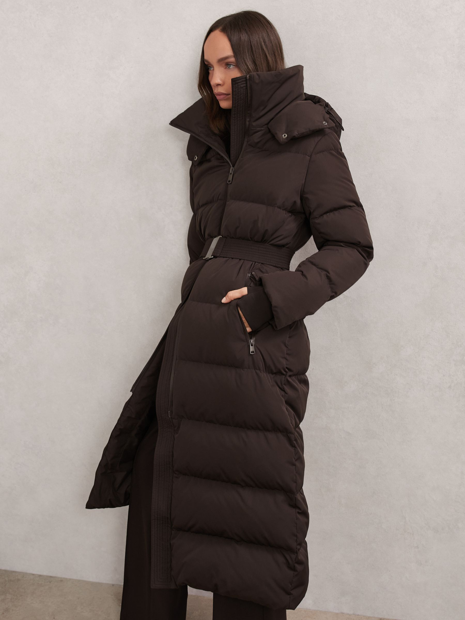 Reiss Petite Belted Longline Hooded Puffer Coat in Chocolate Brown | REISS | Reiss US