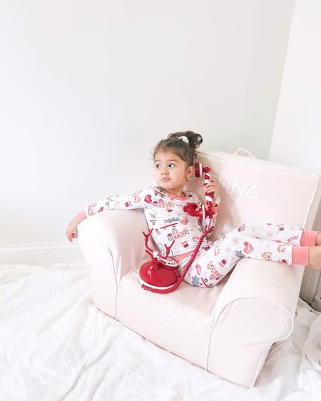 Pajamas are Gallardo & Co. & they donate to the mental help support of nurses!!! The couch shes had for 2 years now and always uses it!! And how cute is the phone? She calls santa on it everyday (or i call santa if i have to LOL)

#santa
#babyholiday
#babypajamas
#bamboopajamas
#christmaspajamas
#toddlerpajamas
#targetfind
#targetbaby
#christmasdecor
#toddlercouch
#toddlergifts
#babygifts
#babysale #cybermonday #christmasgifts

#LTKHoliday #LTKCyberWeek #LTKkids