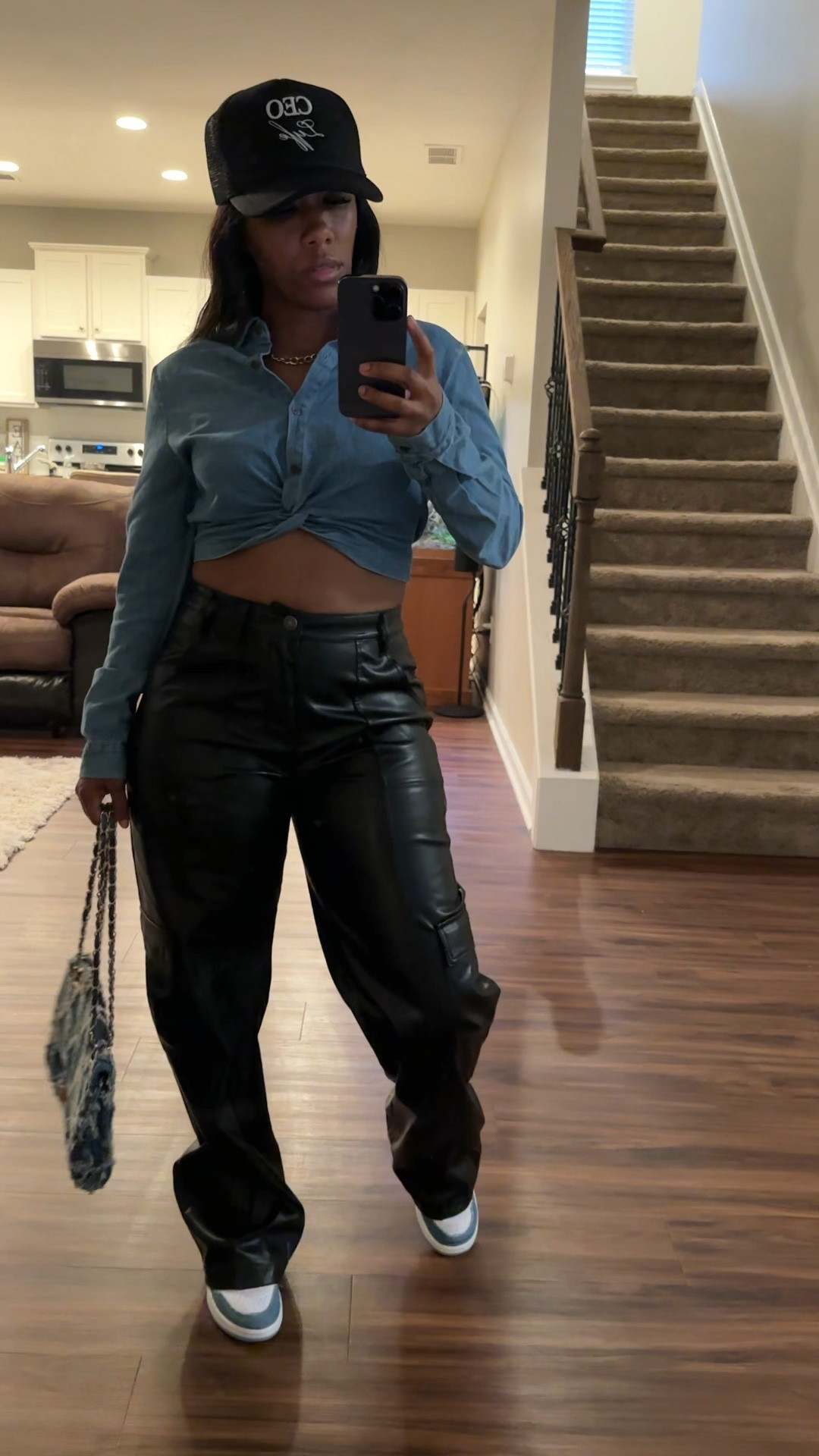 Casual outfit idea. I’m wearing a cropped long sleeve shirt with black faux leather pants, distressed denim bag, and Jordan 1 denim sneakers

#LTKSeasonal #LTKStyleTip #LTKShoeCrush