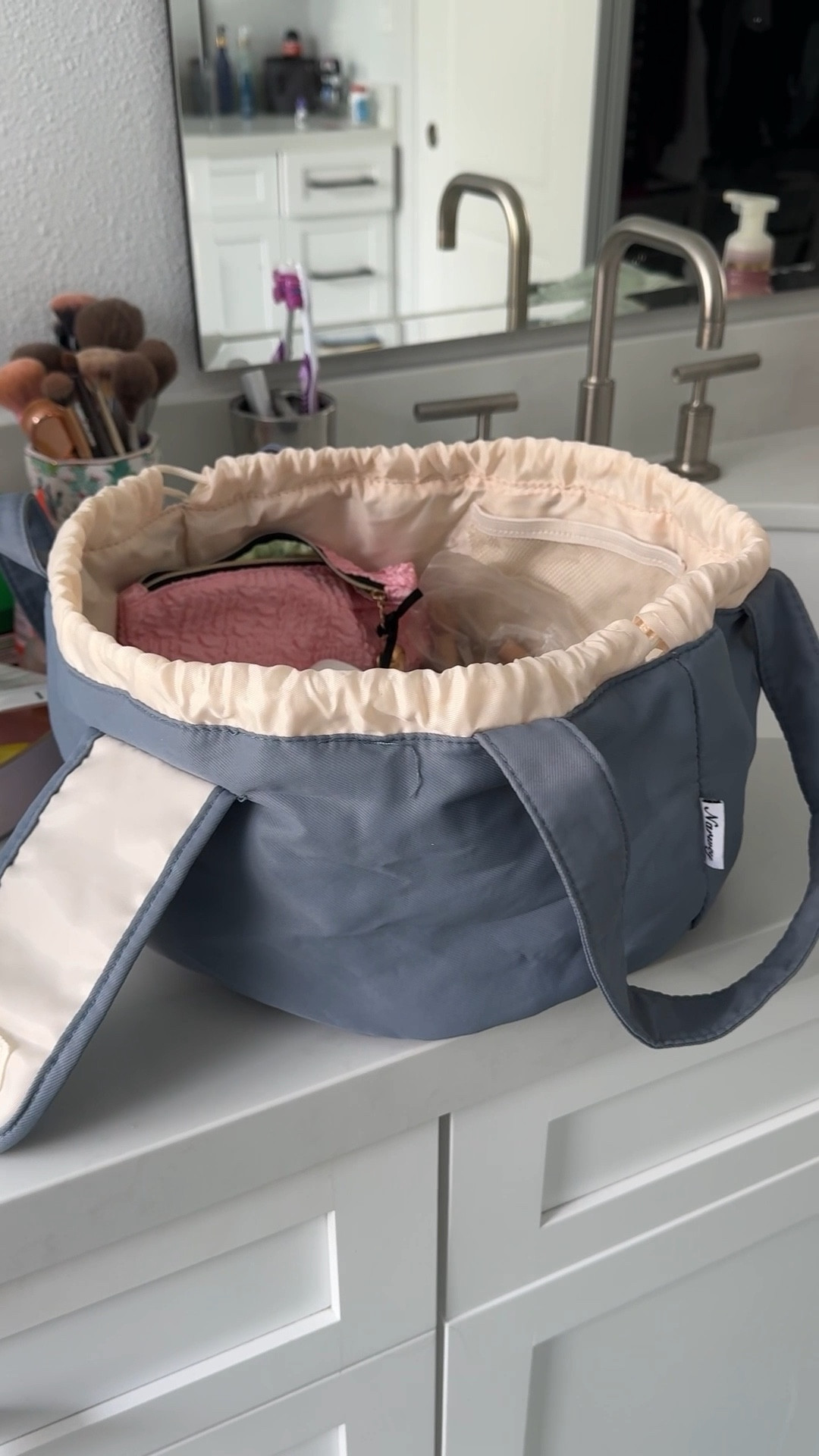 Am I obsessed? Yes, yes I am! My fave makeup bag, travel shower shoes, and a couple dresses! 

#LTKTravel #LTKFindsUnder50 #LTKBeauty