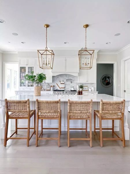 Love these gorgeous rattan kitchen counter stools, and the warmth they bring to my kitchen island! This price is great too, and I've linked a washable cushion if you're looking for that option! Also these are the medium size darlana pendants over my 5x10 foot kitchen island! (5/14)

#LTKStyleTip #LTKHome