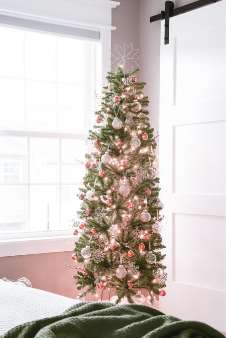 This slim Christmas tree was an awesome Black Friday Amazon find this year. It’s pre-lit and perfect for our bedroom. #christmastree #christmastreedecor #christmasdecor #amazonfinds #christmashome

#LTKhome #LTKHoliday #LTKSeasonal