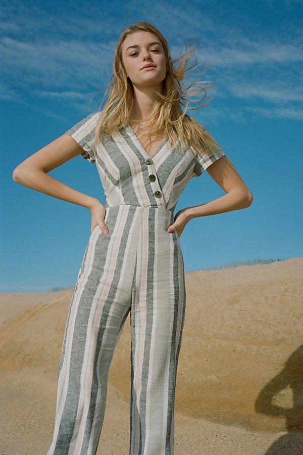 UO Karen Surplice Button-Down Jumpsuit - Assorted XS at Urban Outfitters | Urban Outfitters (US and RoW)