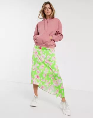 ASOS DESIGN asymmetric high shine satin midi skirt in green floral print | ASOS (Global)