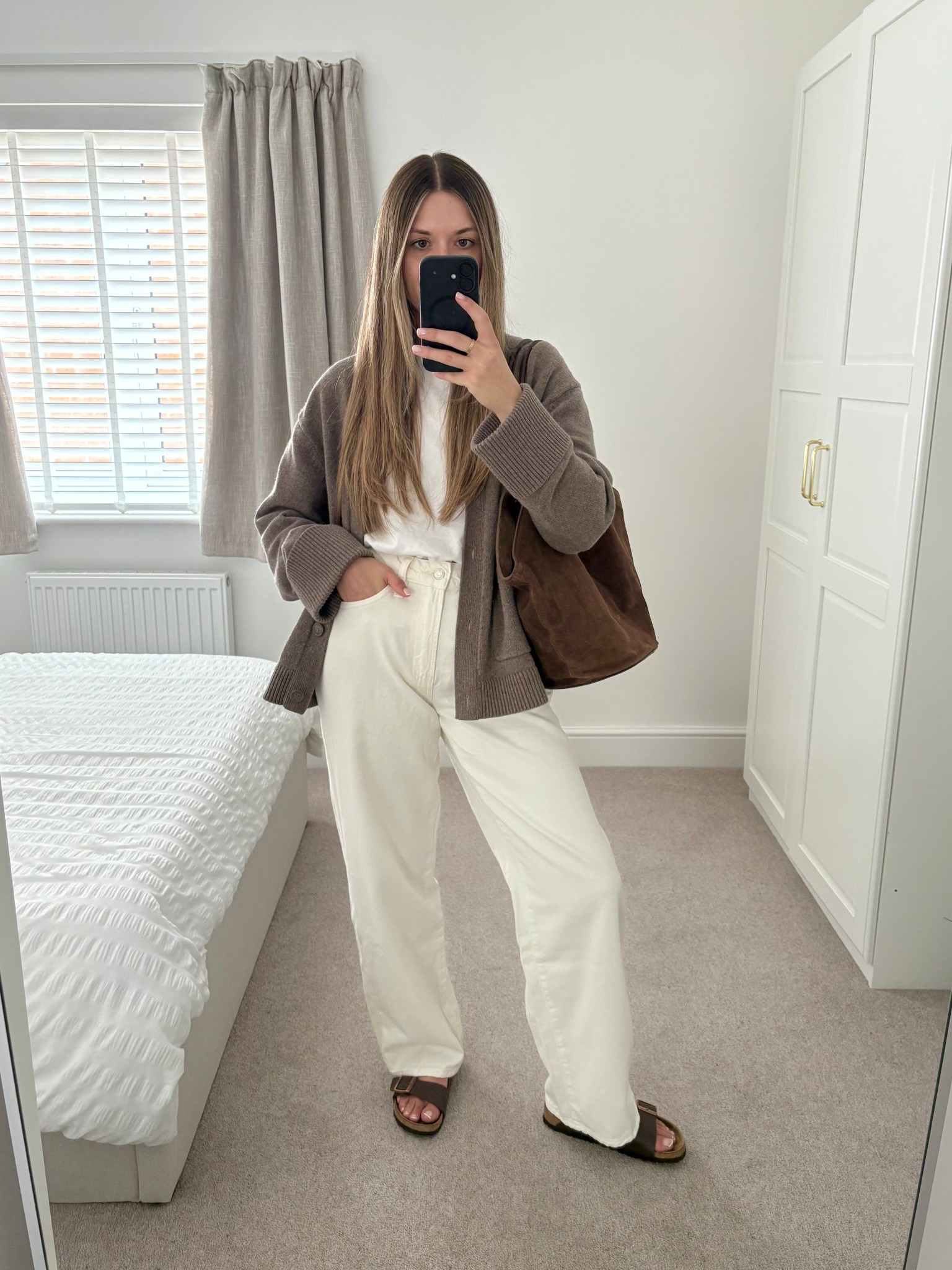 Layers are starting to creep in 👀☕️🤎

A cardigan is my favourite thing to throw on over a summery outfit. I love this one from &otherstories as it’s lightweight (and in my fave colour!). It’s a few years old now so I’ll link alternatives. 

These baggy ecru jeans are so comfortable due to the oversized fit (I recommend sizing down) and I’ve paired them with my favourite topshop white t-shirt. Finishing off the outfit with my brown Birkenstock sandals and suede tote bag. 



#LTKsummer #LTKstyletip #LTKuk